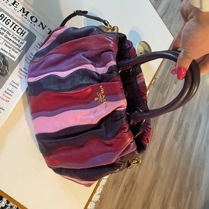 Pristine lambskin Prada bag with top handle.